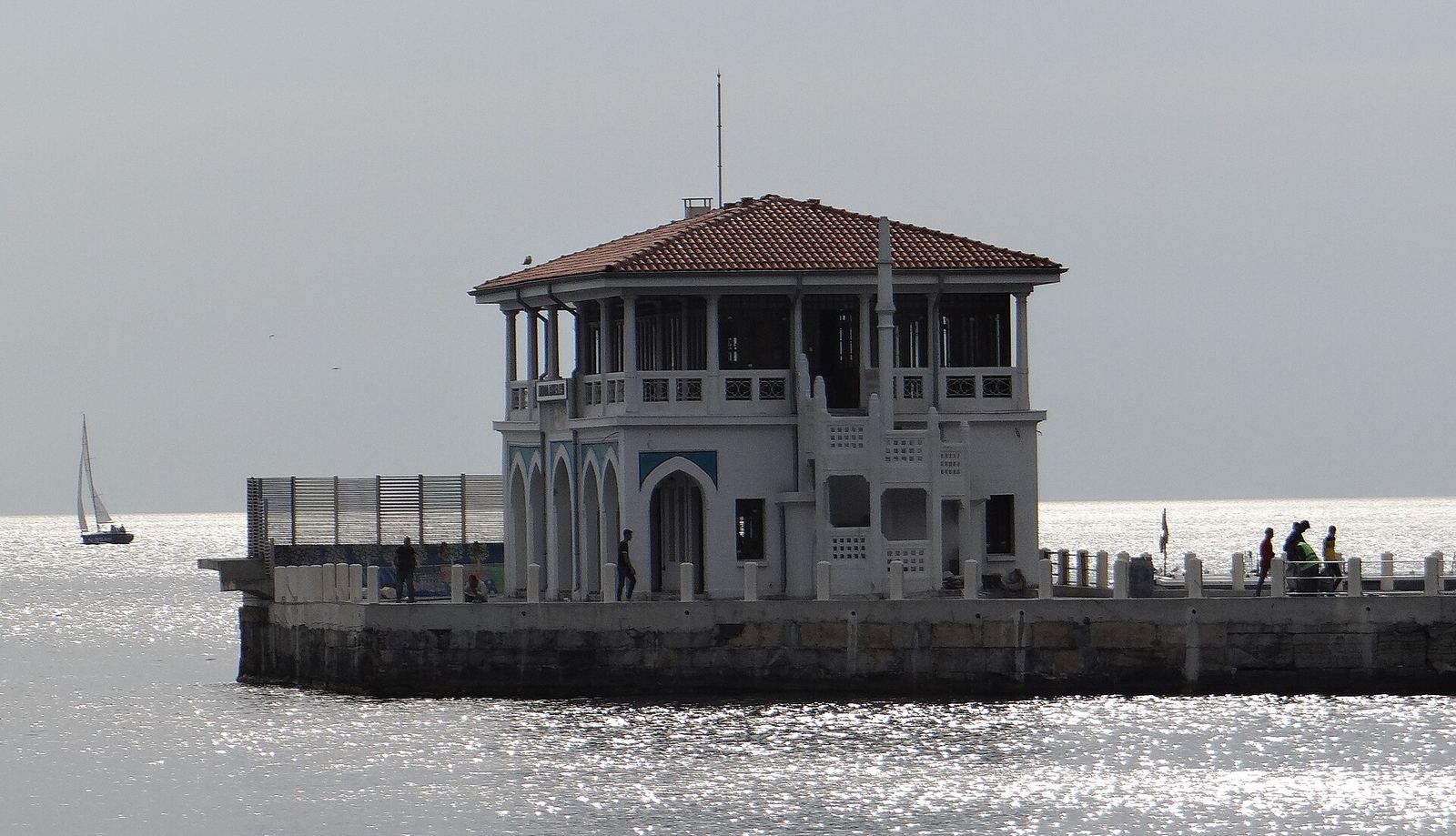 Moda's old ferry pier standing on the water off the shore