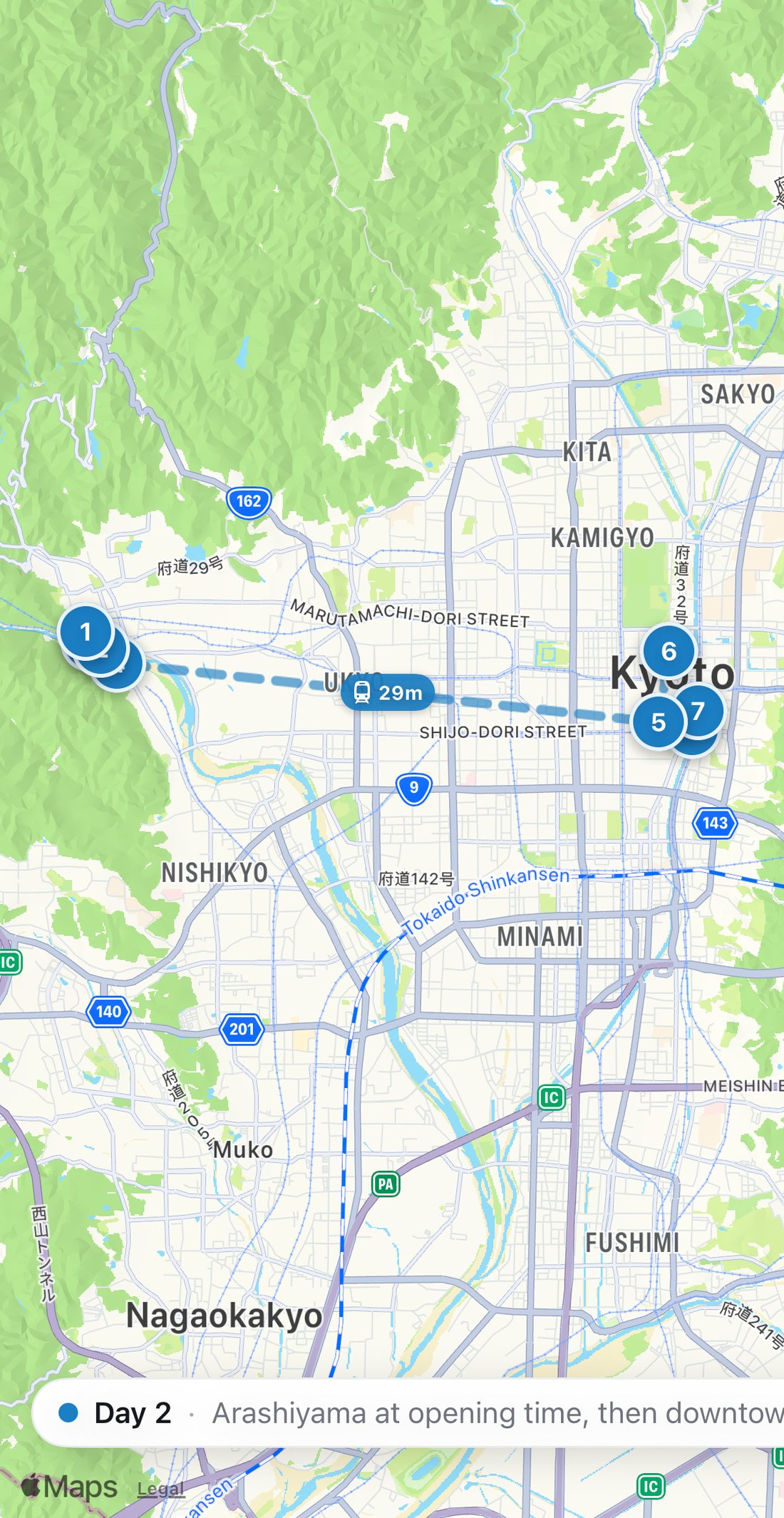 Bilbo's map of Day 2 in Kyoto: eight numbered blue stops on a walking route, from Arashiyama bamboo grove to Pontocho Izumoya.