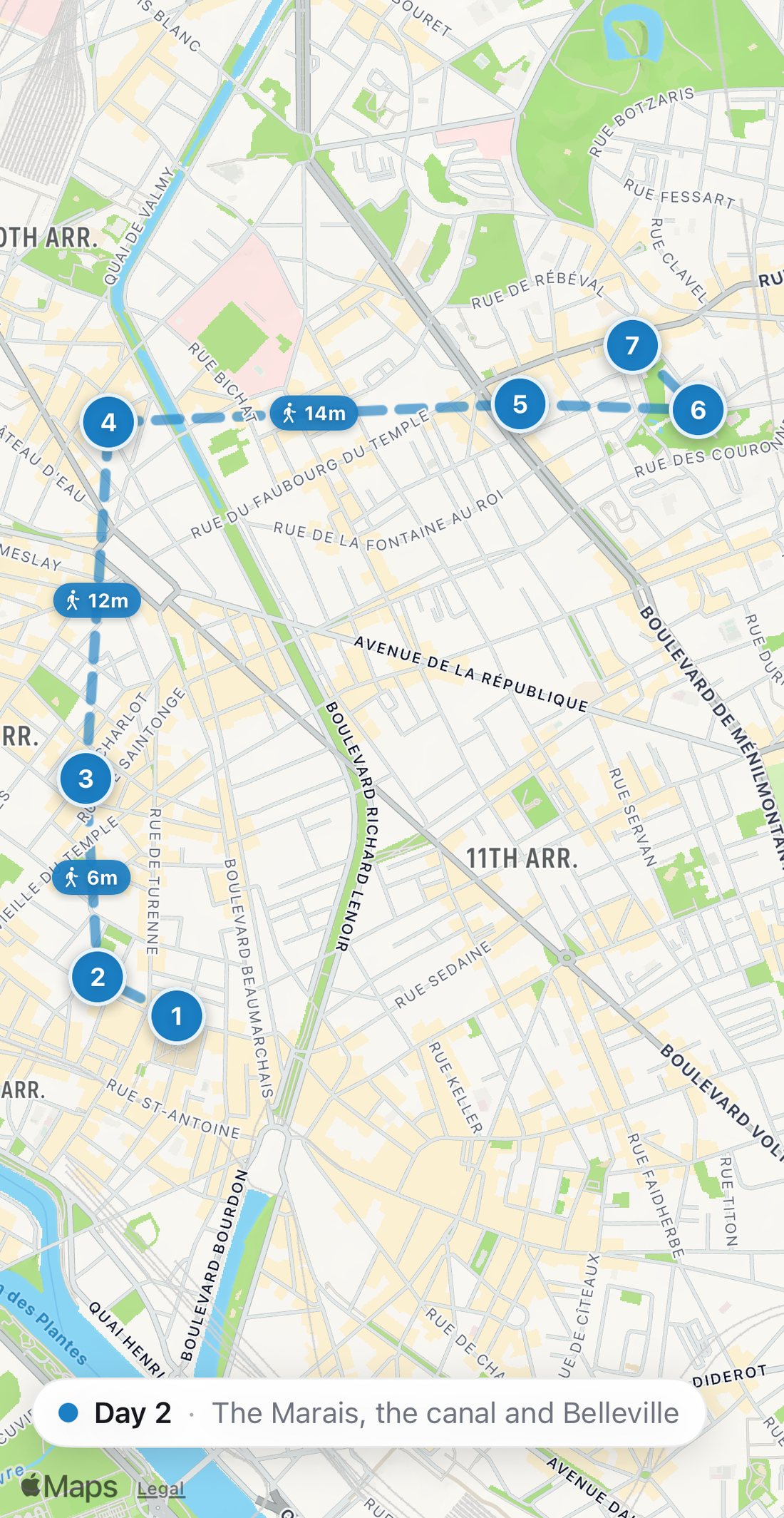 Bilbo's map of Day 2: seven numbered blue stops from Carette on the Place des Vosges through the Marais to the Canal Saint-Martin, Rue Dénoyez, the Parc de Belleville and Le Baratin.