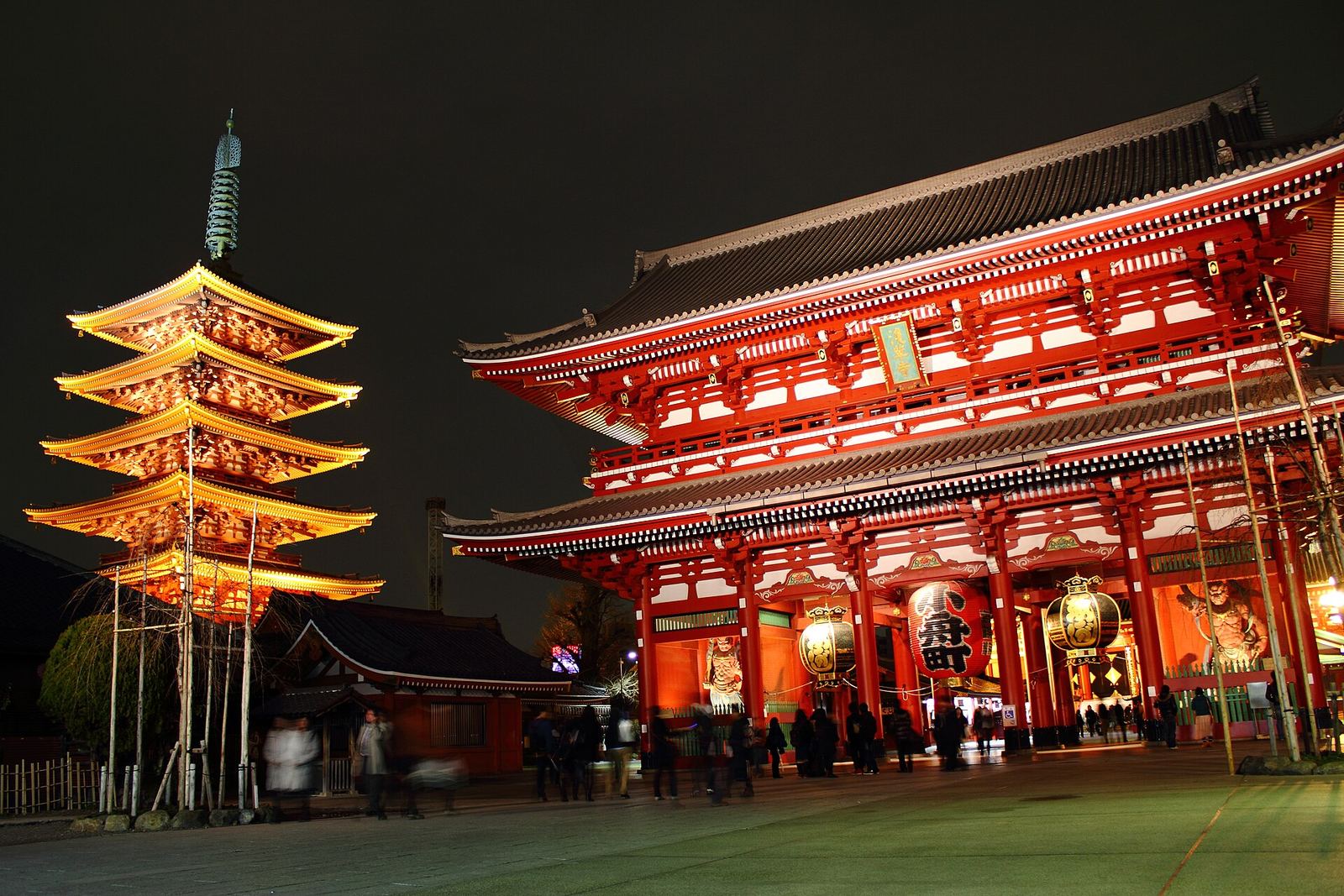 Senso-ji's red Hozomon gate and five-storied pagoda lit up at night in Asakusa